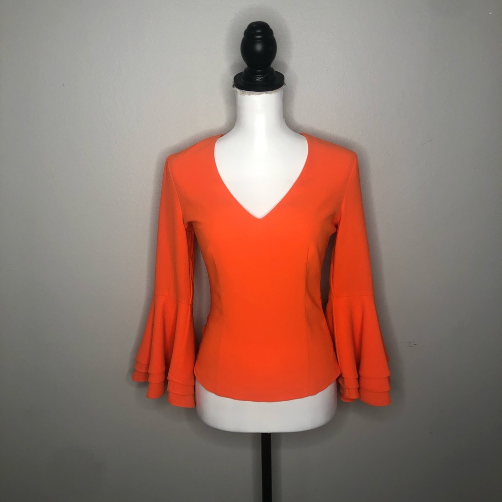 BEBE long sleeve flare top